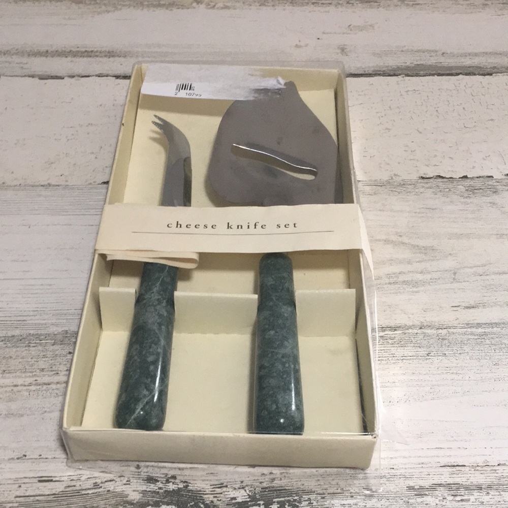Pier 1 stainless steel cheese knife set with green marble handle.